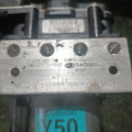 Блок управління ABS гідравлічний рестайл KIA Sorento JC (2002-2009) 589103E500