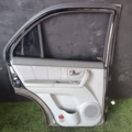 Двері задні ліві Kia Sorento JC (2002-2009) 770033E111