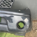 Передній бампер (голий бампер) Nissan Navara D40 (2004-2015) F2022EB241