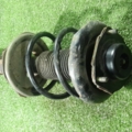 Амортизатор передній лівий голий без пружини Nissan X-Trail T30 (2001-2007) 543038H726
