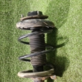 Амортизатор передній лівий голий без пружини Nissan X-Trail T30 (2001-2007) 543038H726
