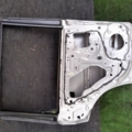 Двері задні ліві Nissan X-Trail T30 (2001-2007) H21018H7MM