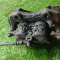 Супорт гальмівний передній лівий Nissan X-Trail T30 (2001-2007) 410118H300