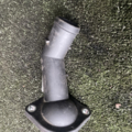 Фланець  системи охолодження Volkswagen Golf IV (1997-2006) 038121121D