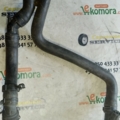 Трубка ож от радиатора нижняя к помпе 1.4i Volkswagen Golf IV (1997-2006) 1J0121049E