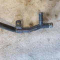 Патрубок системи охолодження Volkswagen Passat B5 (1996-2005) 058121065A