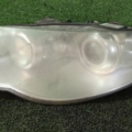 Фара ліва рестайлнг Volkswagen Touareg I (2002-2010) 7L6941031C