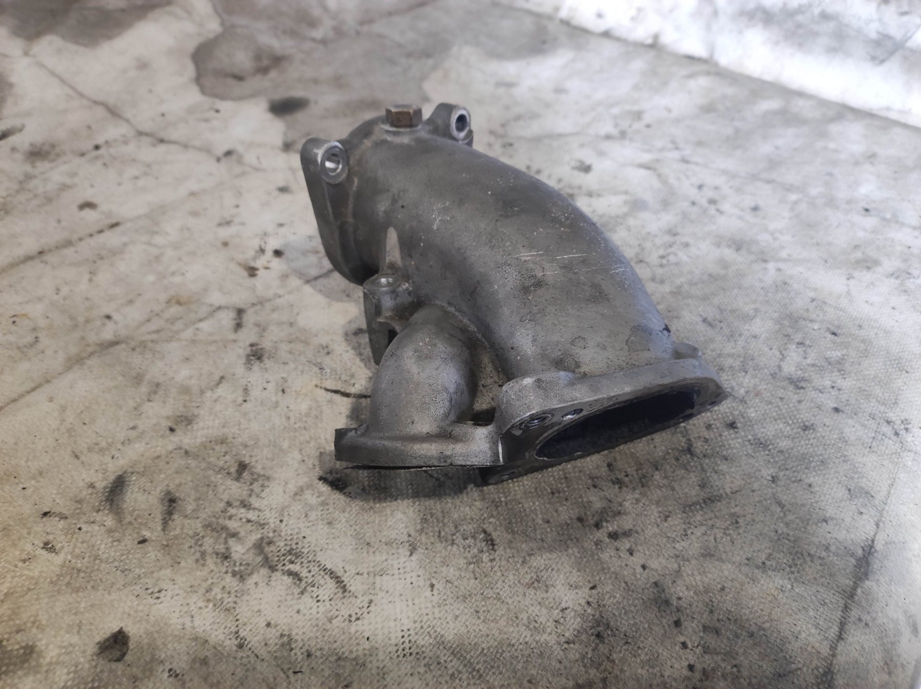 Фланець дросельної заслінки Audi A6 C6 (2004-2011) 059145997H