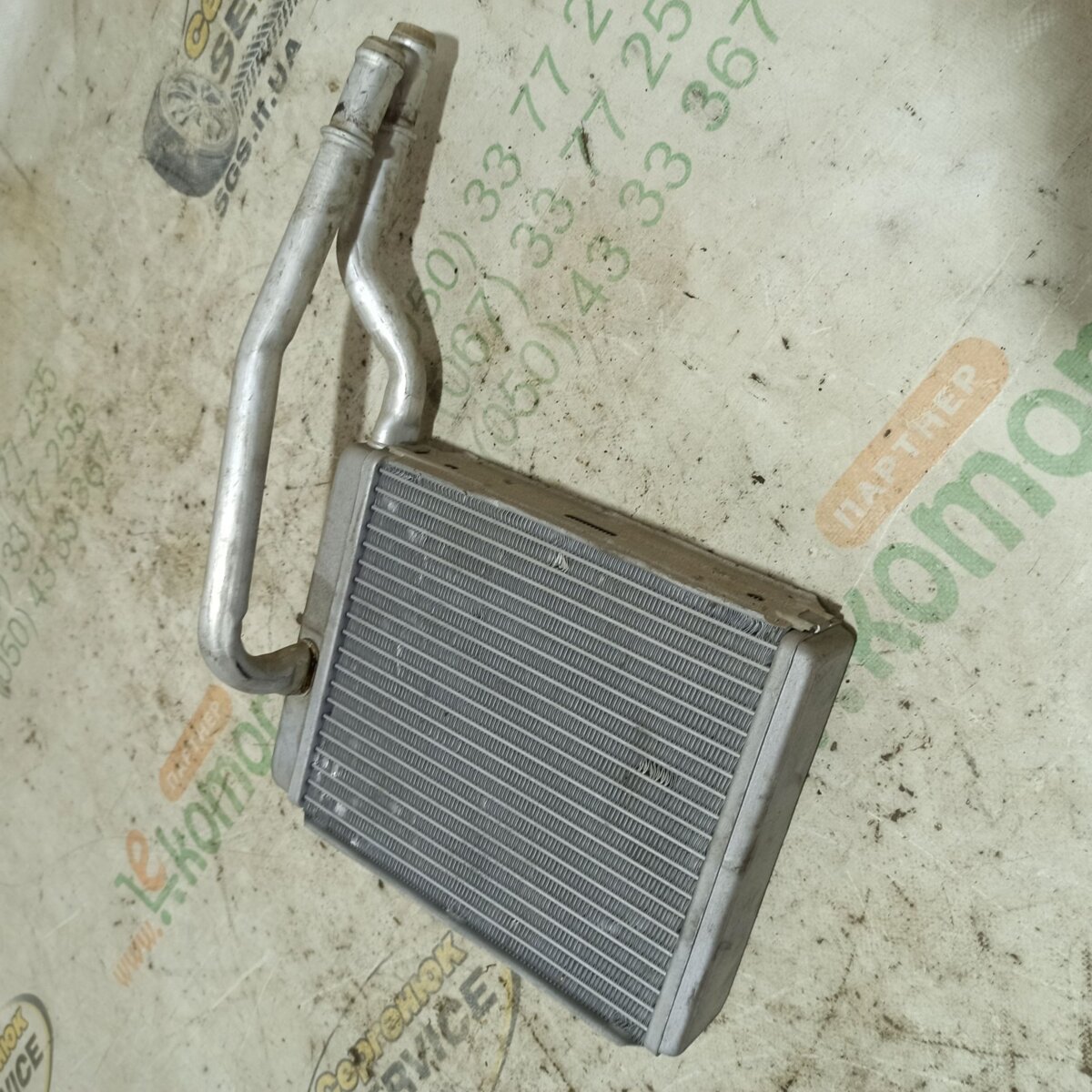 радіатор опалювача салону Ford Transit Connect (2002-до тепер) XS4H18476AB