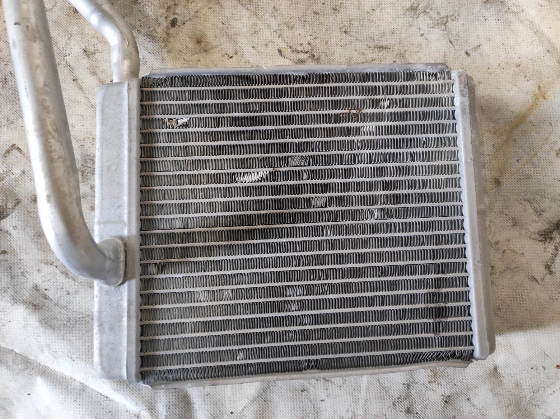 радіатор опалювача салону; теплообмінник; радіатор пічки (обігрівача) Ford Transit Connect (2002-до тепер) XS4H18476AB