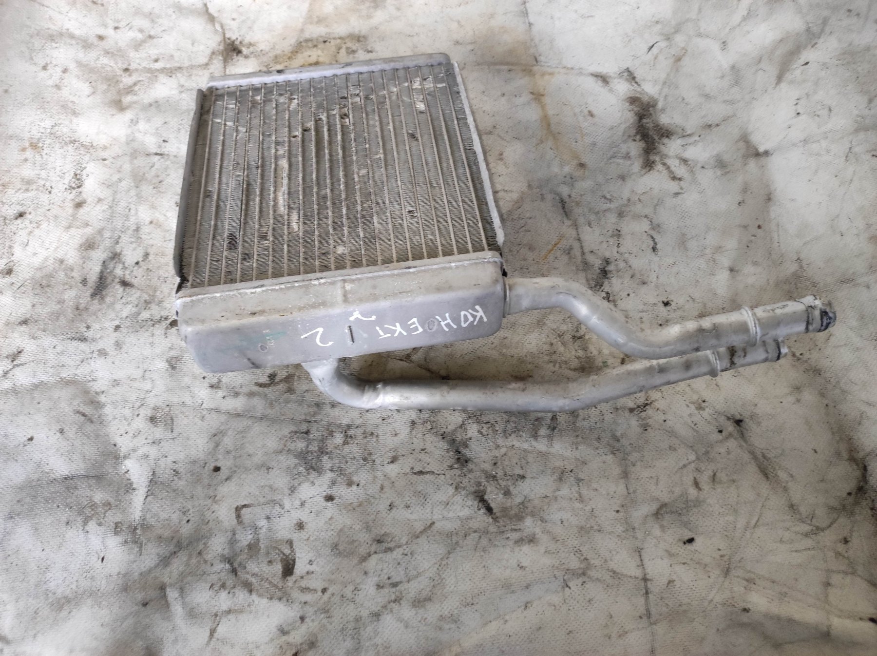 радіатор опалювача салону; теплообмінник; радіатор пічки (обігрівача) Ford Transit Connect (2002-до тепер) XS4H18476AB