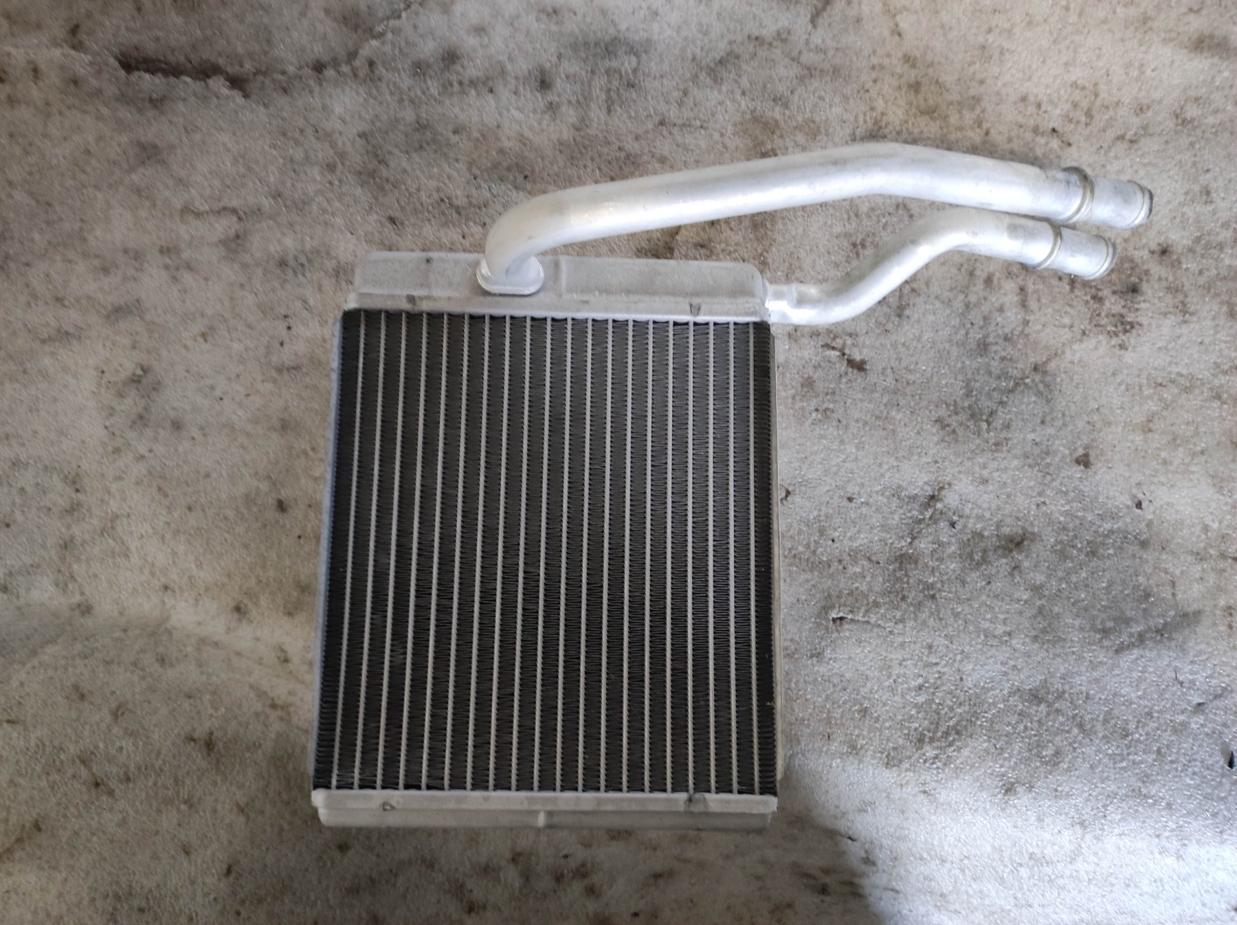 радіатор опалювача салону; теплообмінник; радіатор пічки (обігрівача) Ford Transit Connect (2002-до тепер) XS4H18476AB