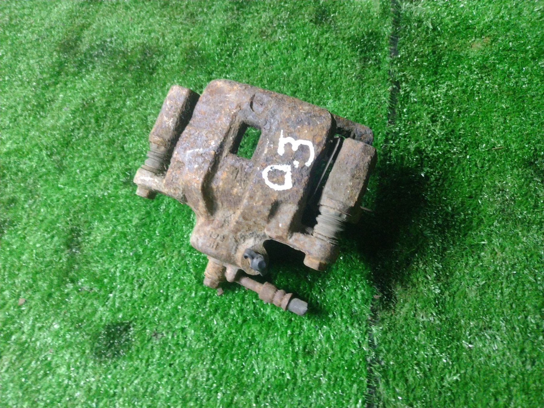 Супорт задній лівий Hyundai Terracan HP (2001-2007) 58310H1A00