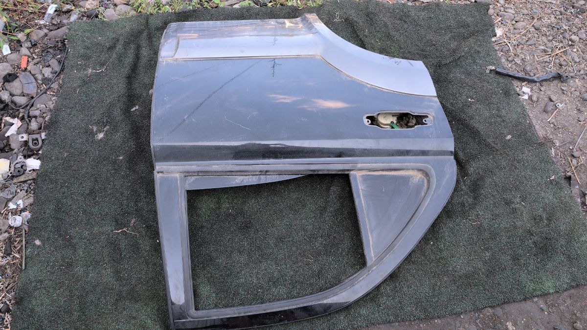 Двері задні праві Kia Sorento JC (2002-2009) 770043E100