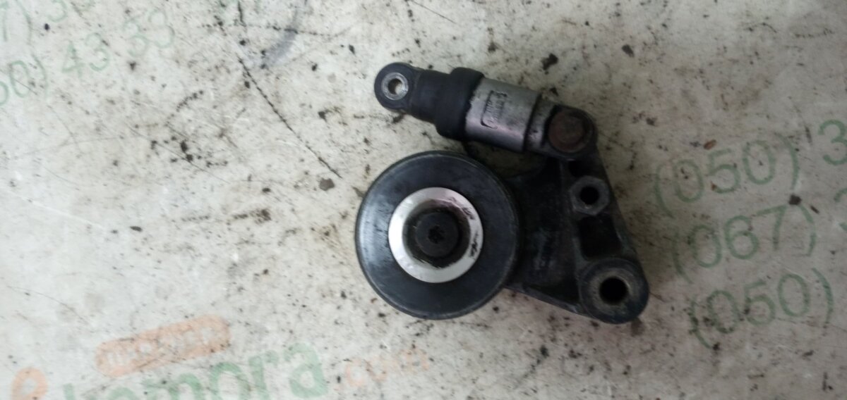 натягувач ременя генератора Nissan Patrol 117502W21C