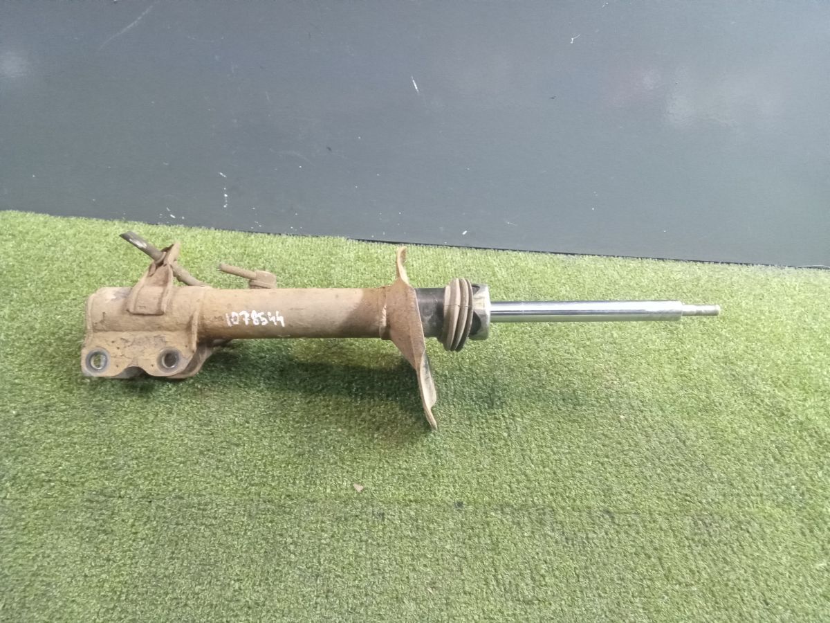 Амортизатор задній лівий Nissan X-Trail T30 (2001-2007) 553038H326