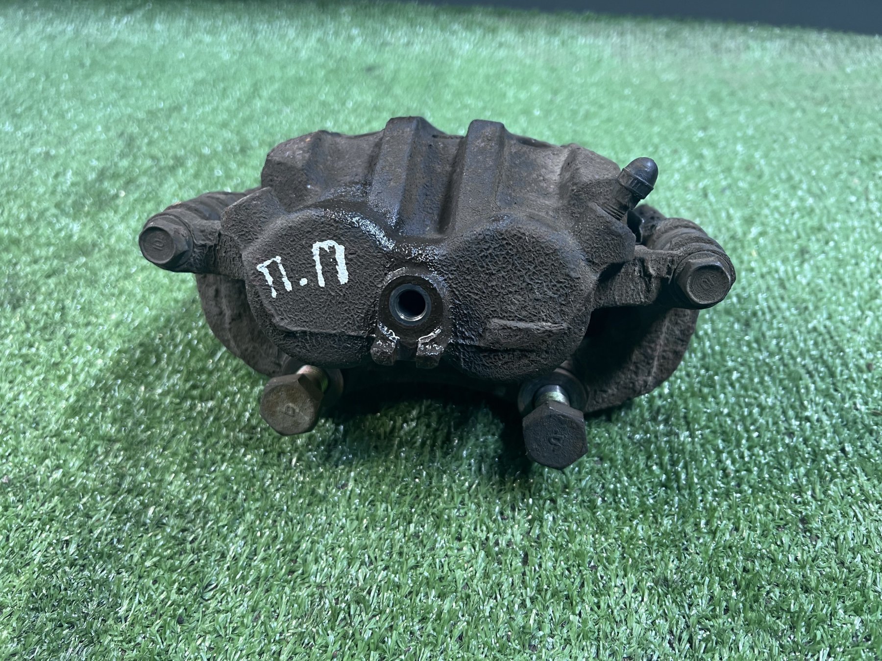 Супорт гальмівний передній правий Nissan X-Trail T30 (2001-2007) 410018H300