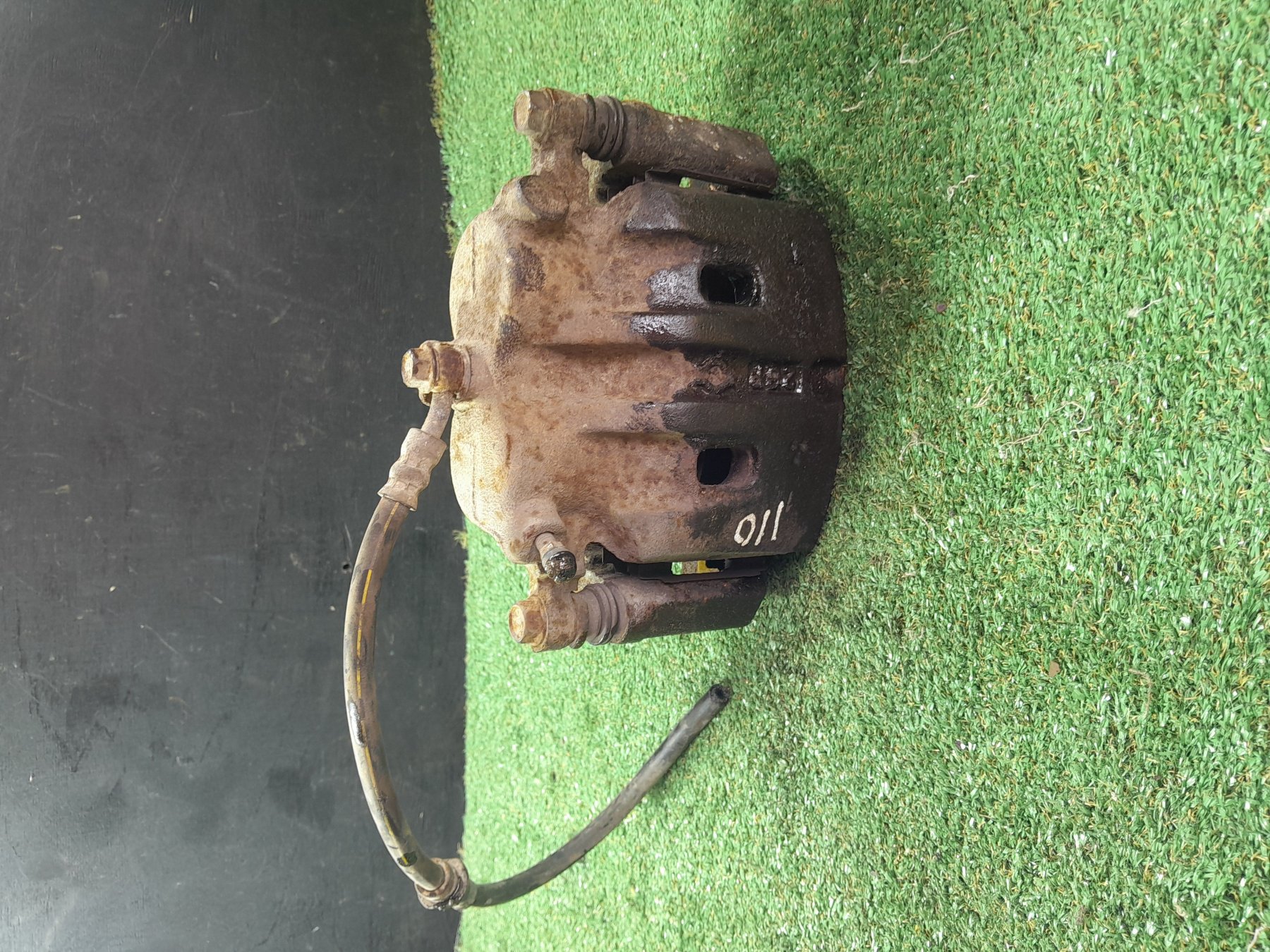 Супорт гальмівний передній правий Nissan X-Trail T30 (2001-2007) 410018H300