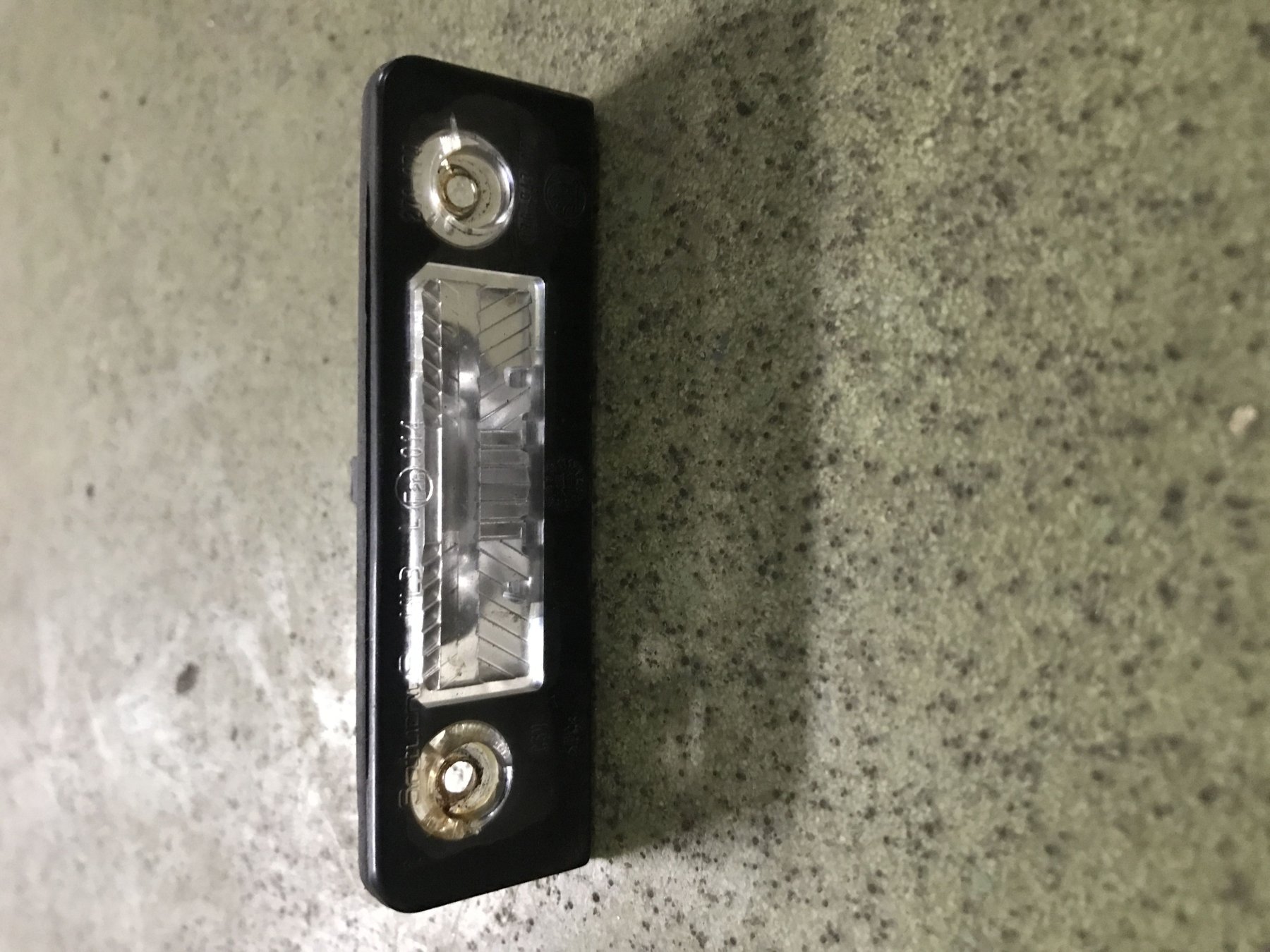ліхтар освітлення номерного знака; ліхтар підсвічування заднього номерного знака Skoda Octavia II (2004-2013) 1Z0943021