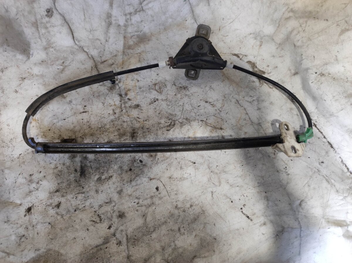 Склопiдйомник заднiй лiвий Volkswagen Golf II 1983-1992 193839401