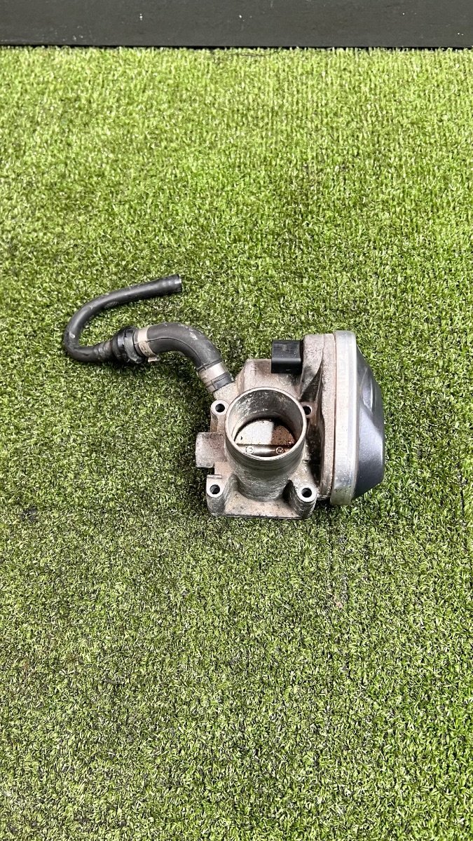 Дросільна заслінка Volkswagen Golf IV (1997-2006) 036133062L