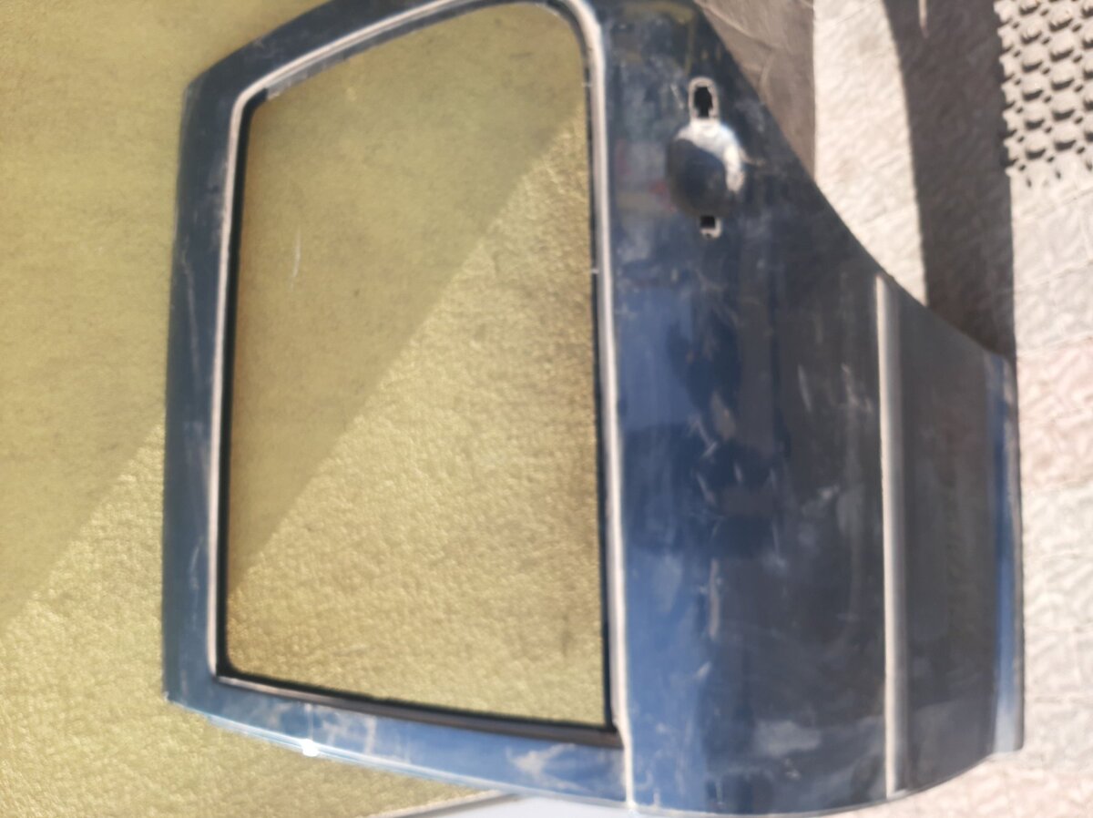 Двері задні ліві Volkswagen Golf IV (1997-2006) 1J6833055F