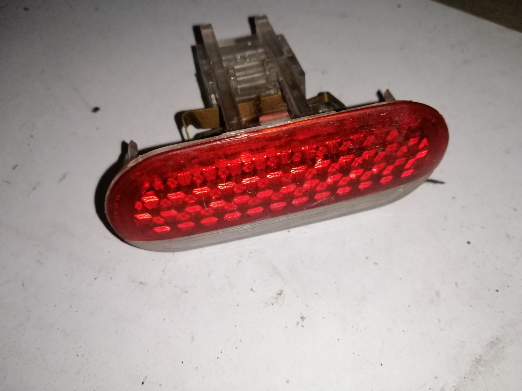 лампа підсвічування в двері, передньої правої Volkswagen Touran I (2003-2010) 1J0947411